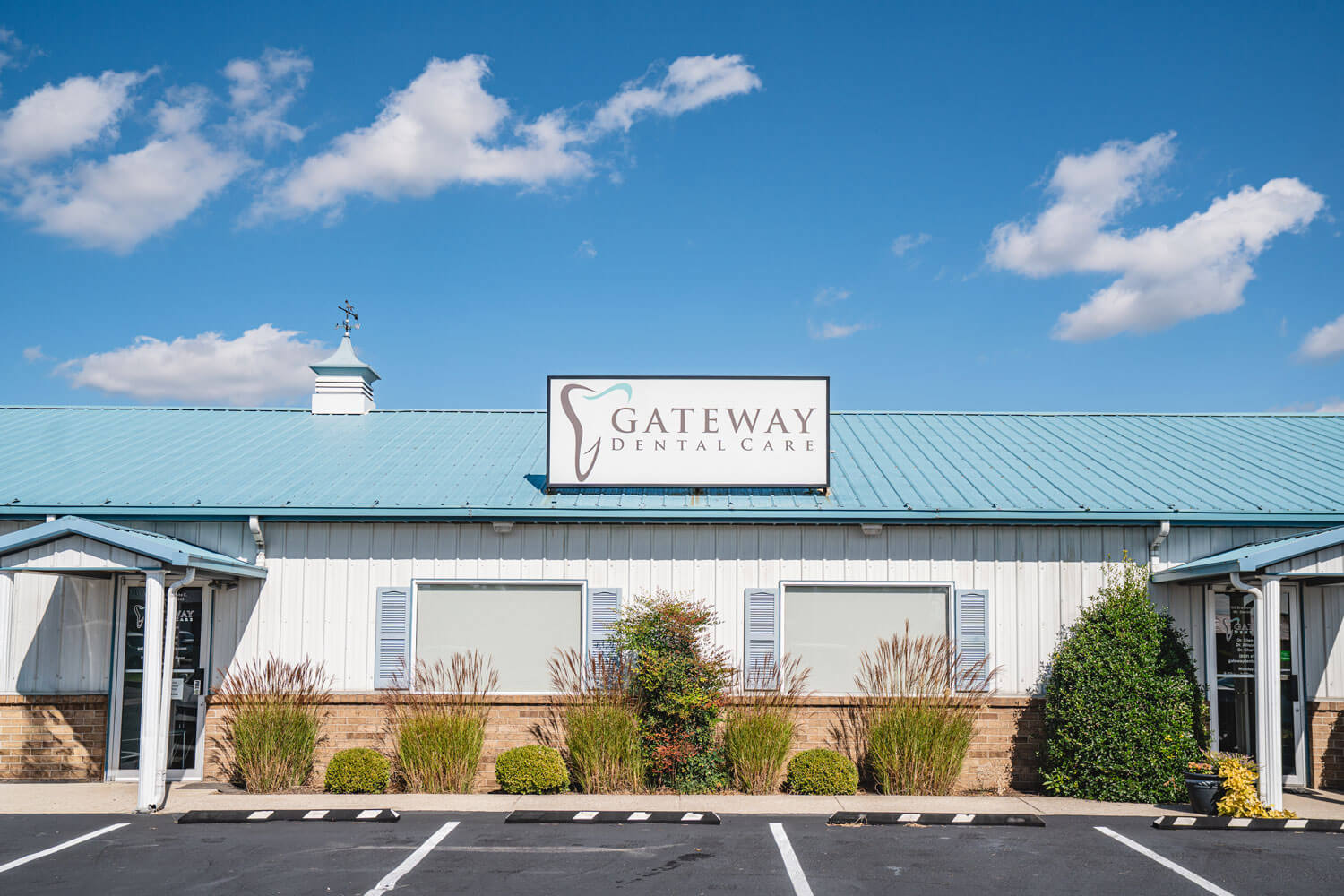 A team member posting for a headshot image